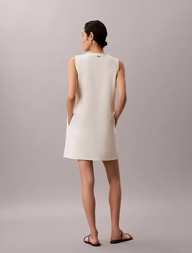 Mini-robe à col en V en interlock Mini-robe à col en V en interlock