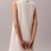 Mini-robe à col en V en interlock Mini-robe à col en V en interlock
