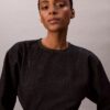 Mini-robe en denim à manches articulées