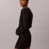 Mini-robe en denim à manches articulées