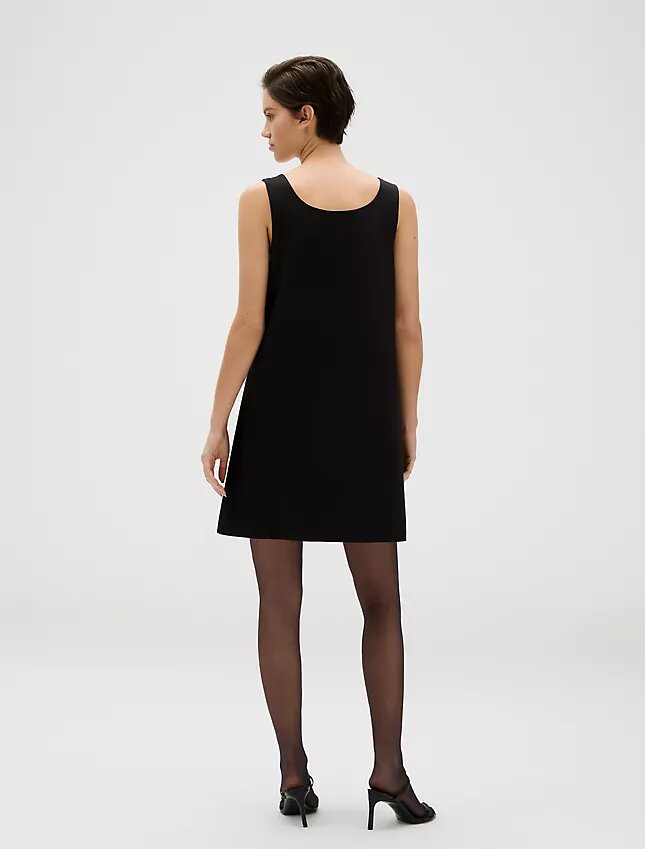 Mini-robe stretch raffinée Mini-robe stretch raffinée
