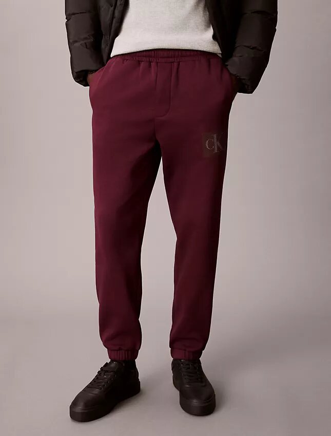 Pantalon de survêtement en molleton avec motif Monogram superposé Pantalon de survêtement en molleton avec motif Monogram superposé
