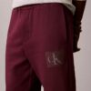 Pantalon de survêtement en molleton avec motif Monogram superposé Pantalon de survêtement en molleton avec motif Monogram superposé