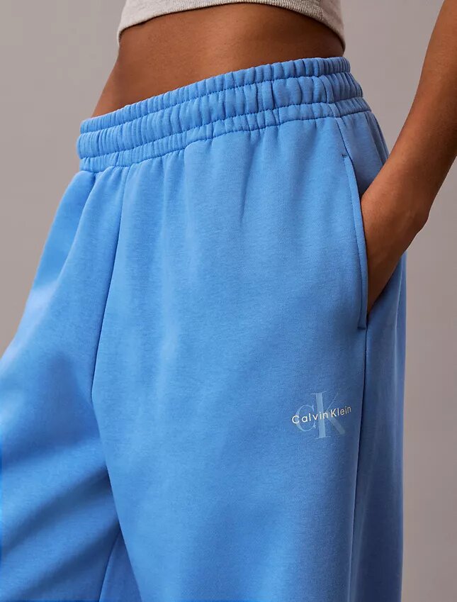 Pantalon de survêtement à jambes larges en molleton Monologo Pantalon de survêtement à jambes larges en molleton Monologo