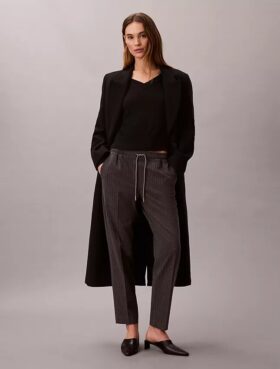 Pantalon fuselé à cordon de serrage et rayures