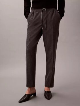 Pantalon fuselé à cordon de serrage et rayures