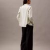 Pantalon à jambes larges en crêpe à fines rayures Pantalon à jambes larges en crêpe à fines rayures