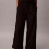 Pantalon à jambes larges en ponte rayé Pantalon à jambes larges en ponte rayé
