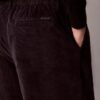 Pantalon large en velours côtelé à plis
