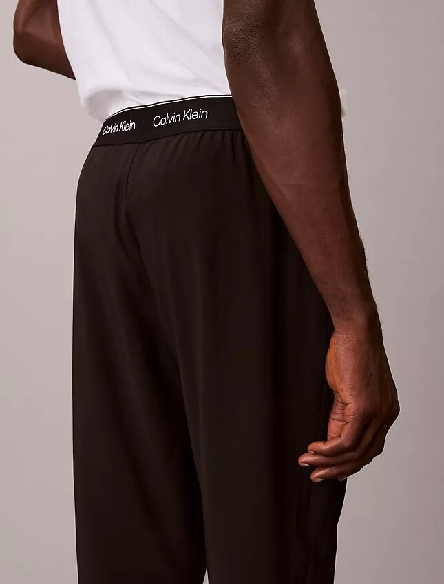 Pantalon tissé avec logo sport moderne à la taille Pantalon tissé avec logo sport moderne à la taille