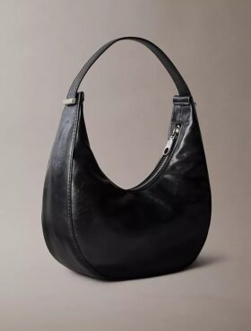 Petit sac à bandoulière convertible aux lignes courbes