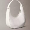 Petit sac à bandoulière convertible aux lignes courbes
