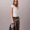 Petit sac à bandoulière convertible aux lignes courbes