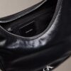 Petit sac à bandoulière incurvé