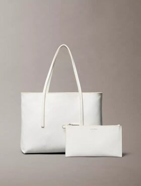 Petit sac fourre-tout avec logo emblématique sur toute la surface et pochette
