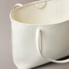 Petit sac fourre-tout avec logo emblématique sur toute la surface et pochette