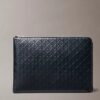 Pochette zippée avec logo emblématique sur toute la surface Pochette zippée avec logo emblématique sur toute la surface