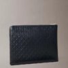 Pochette zippée avec logo emblématique sur toute la surface Pochette zippée avec logo emblématique sur toute la surface