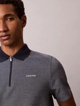 Polo zippé à motif chevrons