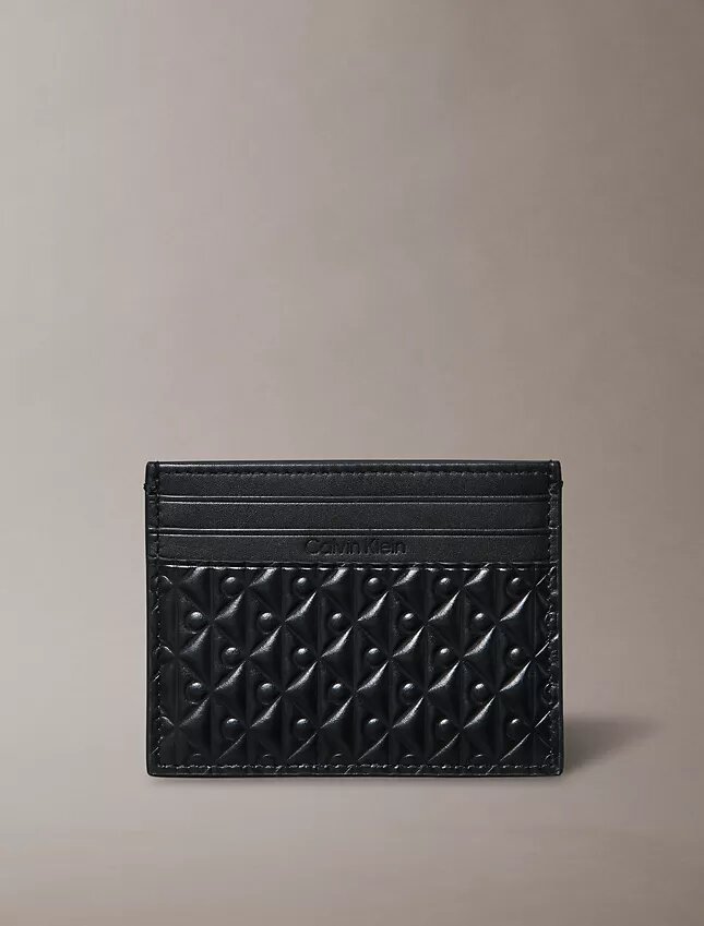 Porte-cartes entièrement gaufré avec un Monogram Porte-cartes entièrement gaufré avec un Monogram