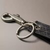 Porte-clés avec logo emblématique sur toute la surface Porte-clés avec logo emblématique sur toute la surface