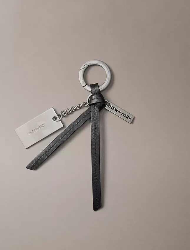 Porte-clés avec logo en lettres cursives Porte-clés avec logo en lettres cursives