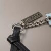 Porte-clés avec logo en lettres cursives Porte-clés avec logo en lettres cursives