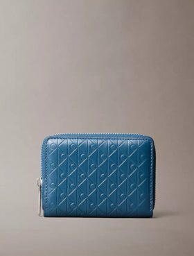Porte-monnaie à fermeture éclair avec monogramme en relief sur toute la surface