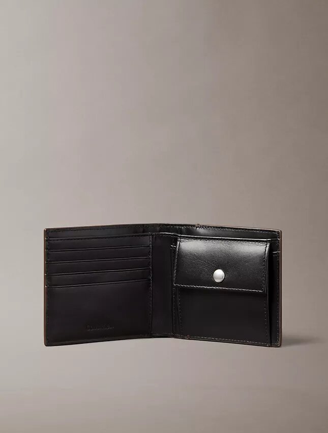 Portefeuille à deux volets avec logo emblématique sur toute la surface et pochette à monnaie Portefeuille à deux volets avec logo emblématique sur toute la surface et pochette à monnaie