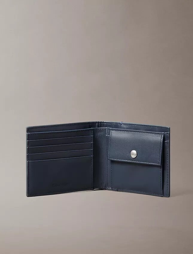 Portefeuille à deux volets avec logo emblématique sur toute la surface et pochette à monnaie Portefeuille à deux volets avec logo emblématique sur toute la surface et pochette à monnaie