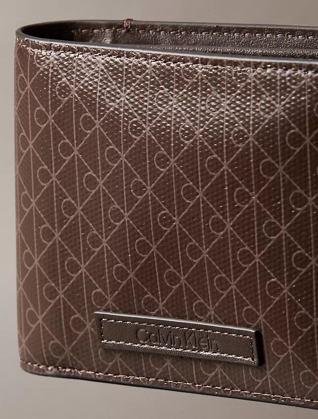 Portefeuille à deux volets avec logo emblématique sur toute la surface et pochette à monnaie Portefeuille à deux volets avec logo emblématique sur toute la surface et pochette à monnaie