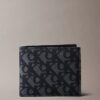 Portefeuille à deux volets avec monogramme sur toute la surface Portefeuille à deux volets avec monogramme sur toute la surface