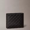 Portefeuille à deux volets avec motif monogramme en relief sur toute la surface et pochette à monnaie Portefeuille à deux volets avec motif monogramme en relief sur toute la surface et pochette à monnaie