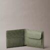 Portefeuille à deux volets en cuir grainé avec poche à monnaie Portefeuille à deux volets en cuir grainé avec poche à monnaie