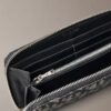 Portefeuille long zippé avec motif Monogram sur toute la surface Portefeuille long zippé avec motif Monogram sur toute la surface