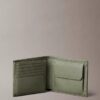 Portefeuille à trois volets en cuir grainé avec poche à monnaie Portefeuille à trois volets en cuir grainé avec poche à monnaie