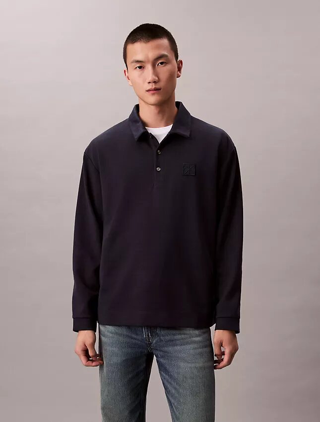 Pull ample avec logo emblématique Pull ample avec logo emblématique