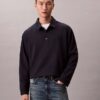 Pull ample avec logo emblématique Pull ample avec logo emblématique
