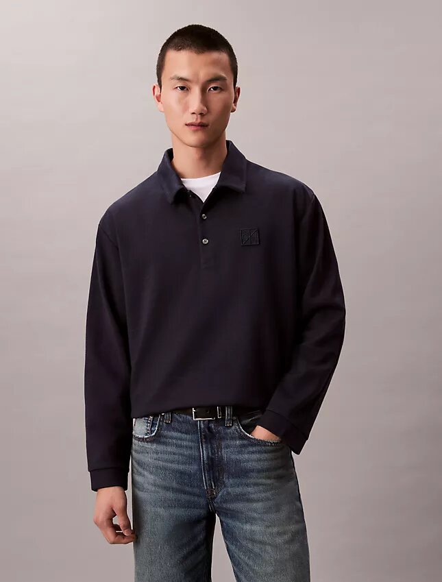 Pull ample avec logo emblématique Pull ample avec logo emblématique