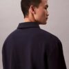 Pull ample avec logo emblématique Pull ample avec logo emblématique