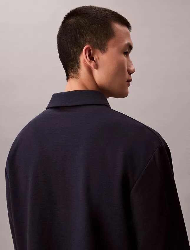 Pull ample avec logo emblématique Pull ample avec logo emblématique