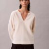 Pull ample à col en V en laine mérinos
