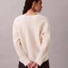 Pull ample à col en V en laine mérinos