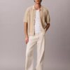 Pull-over en coton à boutons Pull-over en coton à boutons