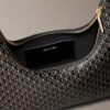 Sac à bandoulière avec logo emblématique sur toute la surface