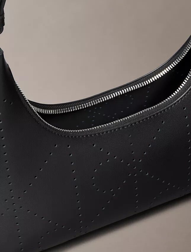 Sac à bandoulière avec logo perforé Sac à bandoulière avec logo perforé