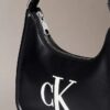 Sac à bandoulière avec monogramme en relief