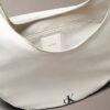 Sac à bandoulière convertible incurvé