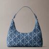 Sac à bandoulière en Denim avec logo emblématique sur toute la surface