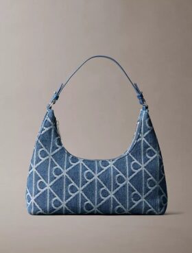 Sac à bandoulière en Denim avec logo emblématique sur toute la surface